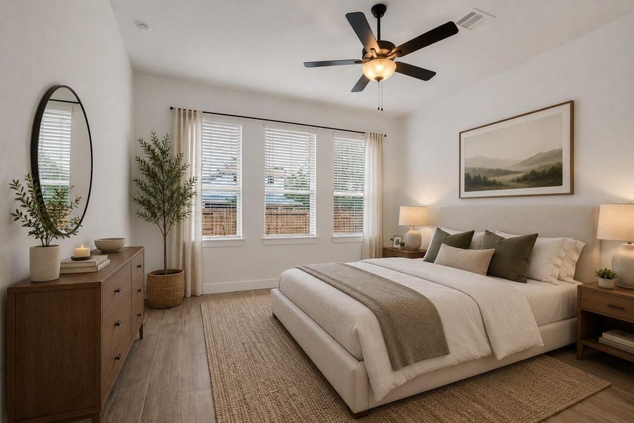 Primary Bedroom with En-Suite Bath, Located on the first floor. Virtually staged photo