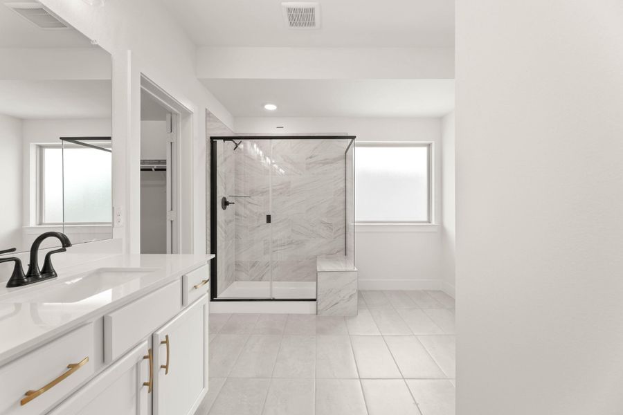 Representative furnished interior of a home built from the Laurel by Tri Pointe Homes in Treeline, Justin (Image 10).