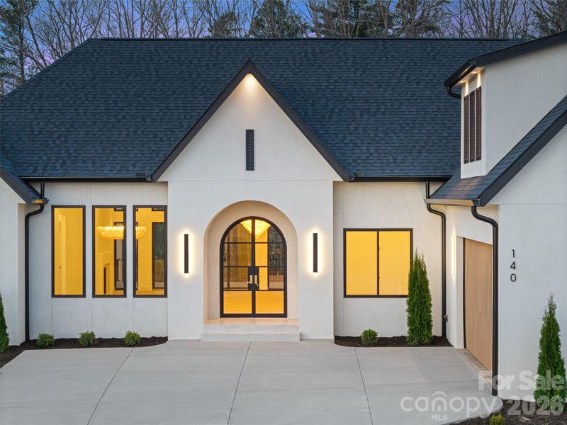 Exterior details and patio area of a home in , Fletcher (Image 27).