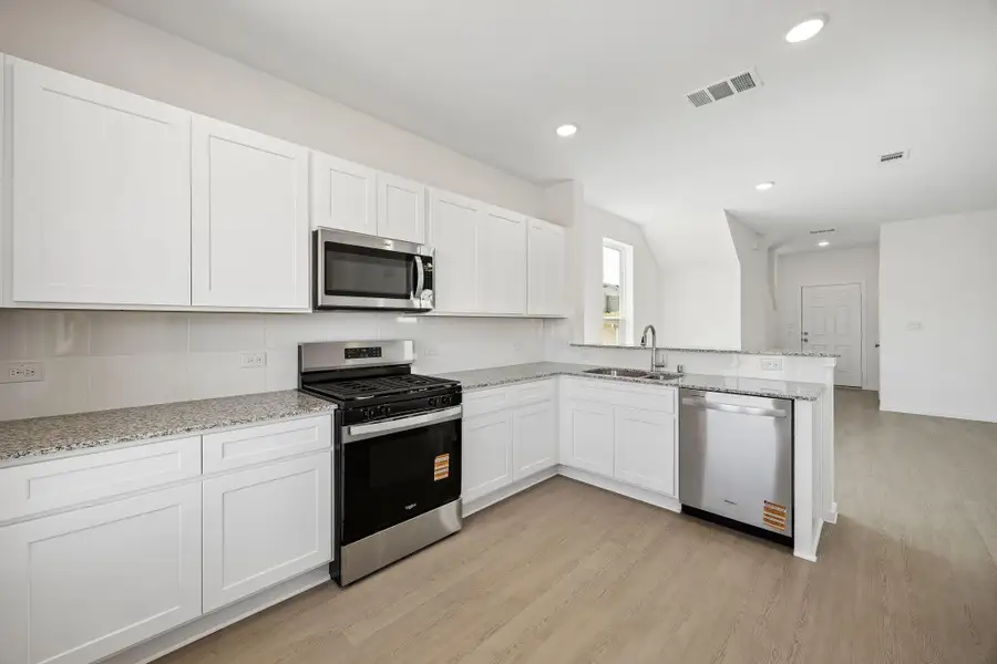 Furnished interior view inside a new home in Montgomery Bend, Montgomery (Image 8).