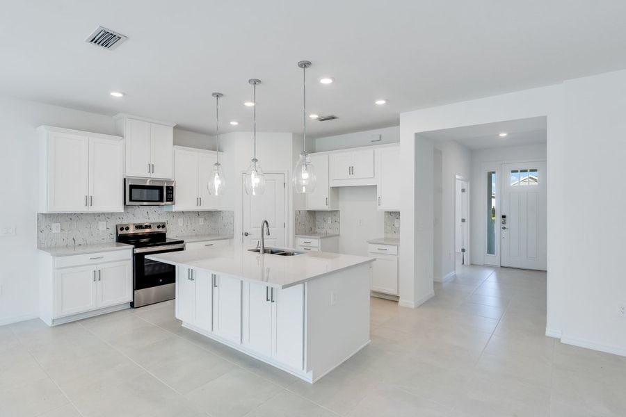 Representative furnished interior of a home built from the Maui by Taylor Morrison in Palms at Coasterra, Palmetto (Image 5). Representative furnished interior of a home built from the Maui by Taylor Morrison in Palms at Coasterra, Palmetto (Image 5).