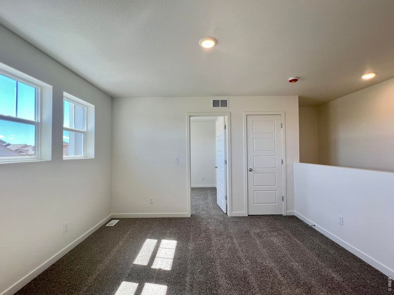 Spacious, unfurnished interior of a new home in Union Colony West, Greeley (Image 17).