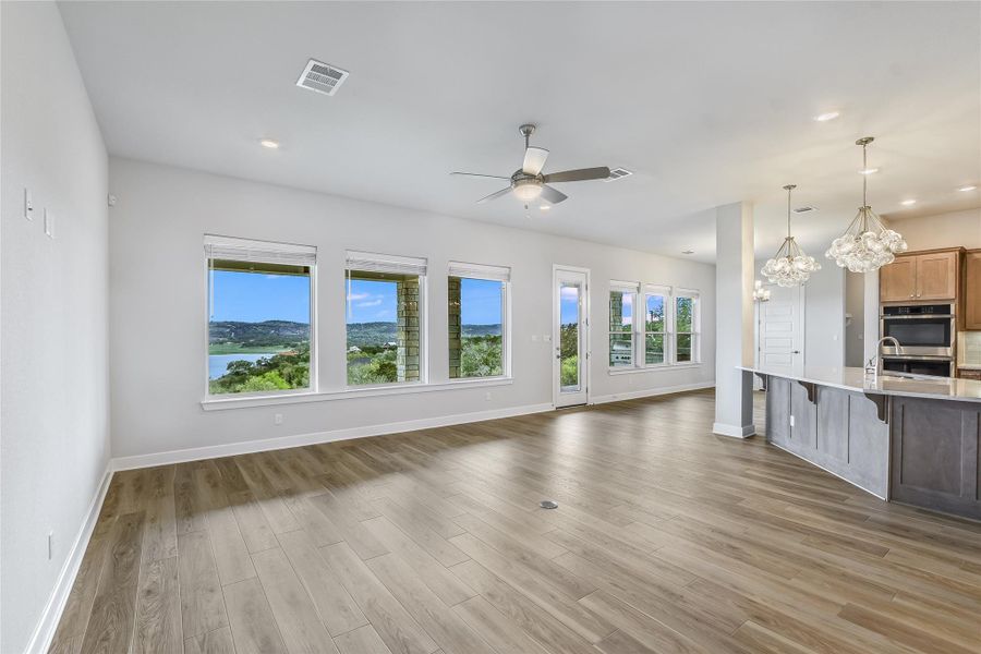 Gorgeous windows let the natural light into the family room, dining room and kitchen.