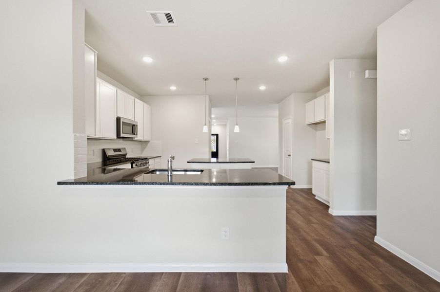 Furnished interior view inside a new home in The Pines at Seven Coves, Willis (Image 10).