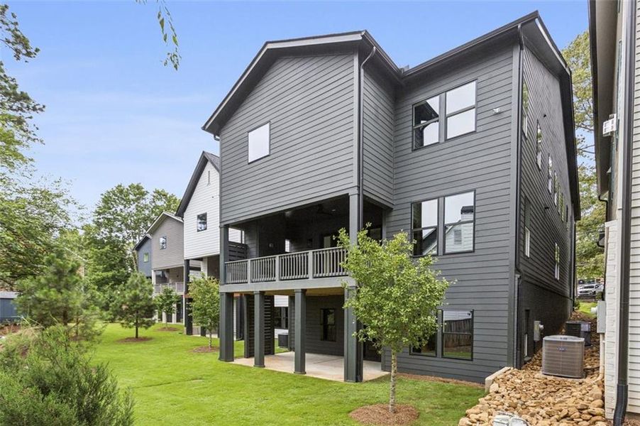Front exterior of a new home in , Brookhaven, GA, highlighting curb appeal (Image 1).