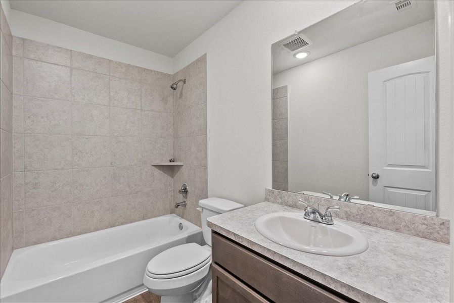 Furnished interior view inside a new home in Mecom Way, Hitchcock (Image 15). Furnished interior view inside a new home in Mecom Way, Hitchcock (Image 15).