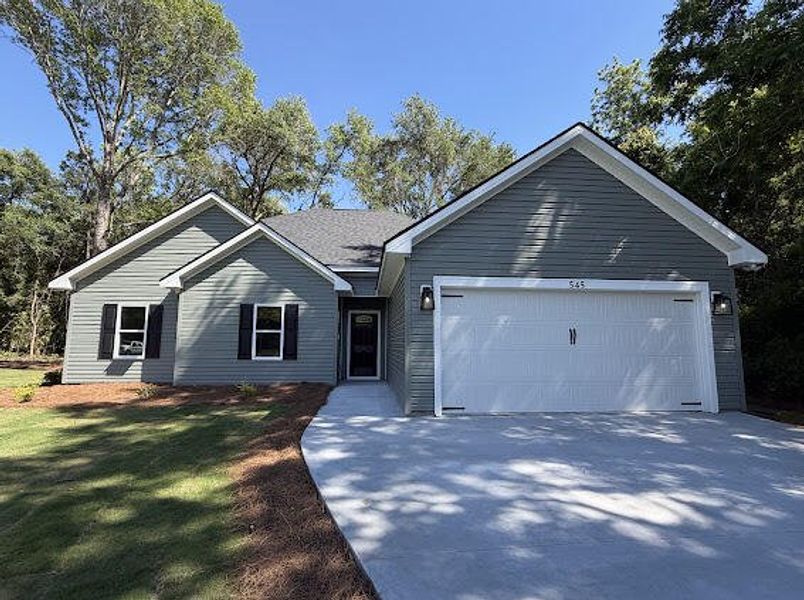 Front exterior of a new home in , McClellanville, SC, highlighting curb appeal (Image 2). Front exterior of a new home in , McClellanville, SC, highlighting curb appeal (Image 2).