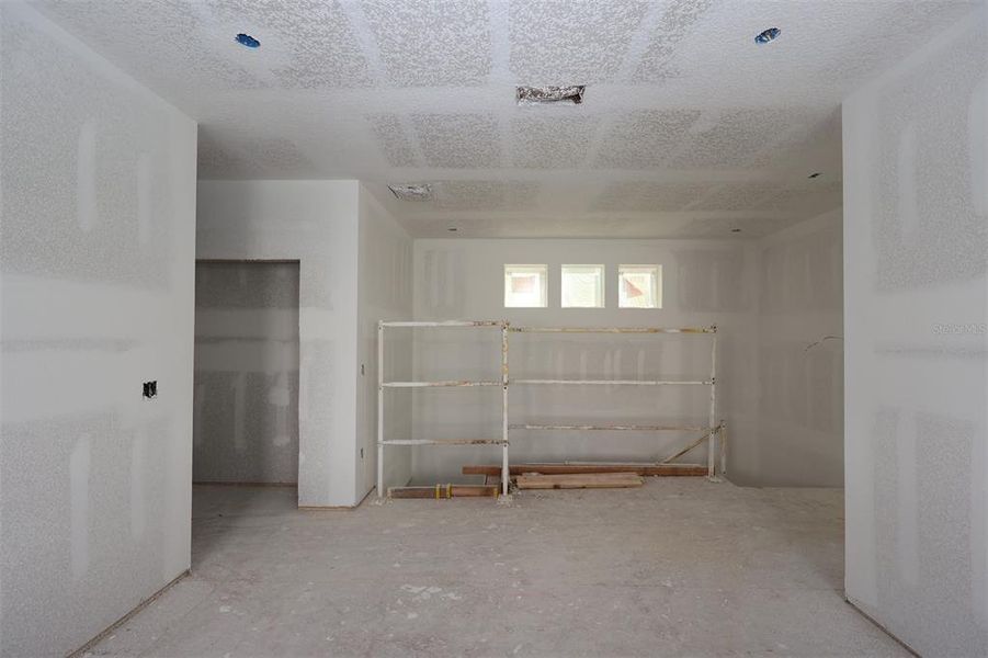 In-progress construction of a new home in Lake Star at Ovation, Winter Garden, FL (Image 25).