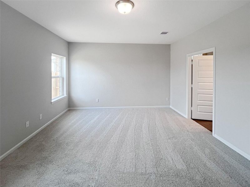 The Caldwell- Primary Bedroom Suite. Sample image for illustration; upgrades, options, and colors may vary.