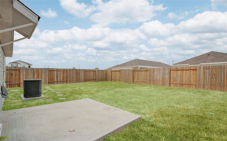 Exterior details and patio area of a home in Wayside Village, Houston (Image 4).