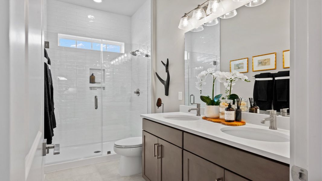 Representative furnished interior of a home built from the Traveler by DRB Elevate. in Summerwind Crossing at Lakes of Cane Bay, Summerville (Image 25).