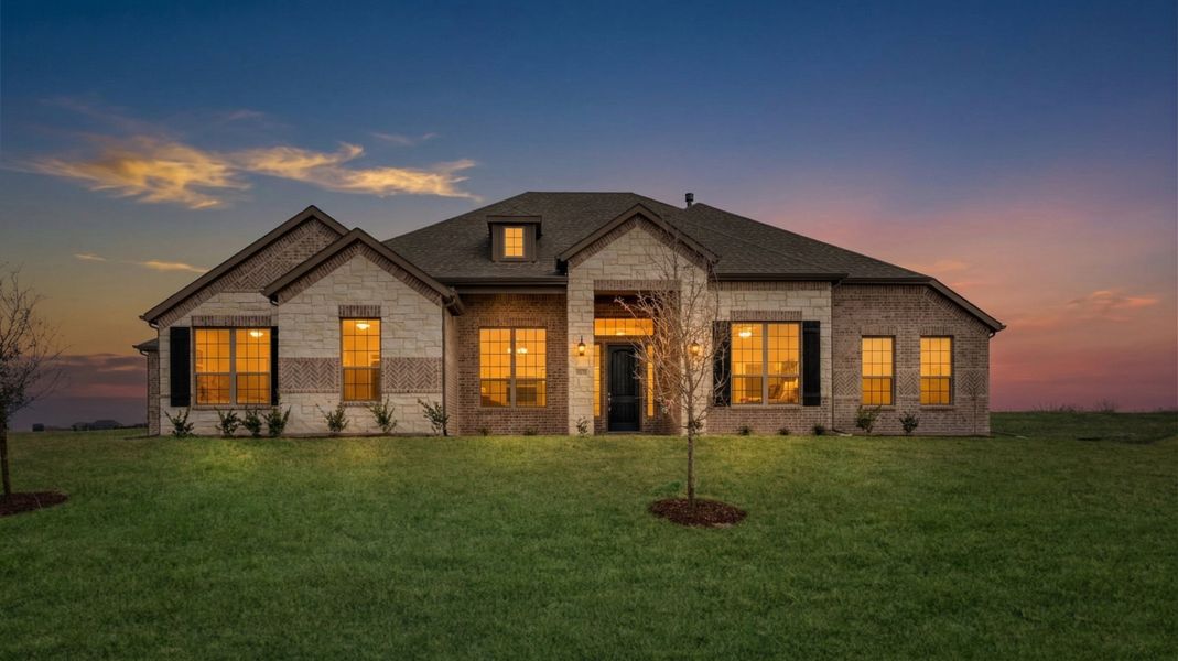 Front exterior of a new home in Berkshire Estates, Mesquite, TX, highlighting curb appeal (Image 2). Front exterior of a new home in Berkshire Estates, Mesquite, TX, highlighting curb appeal (Image 2).