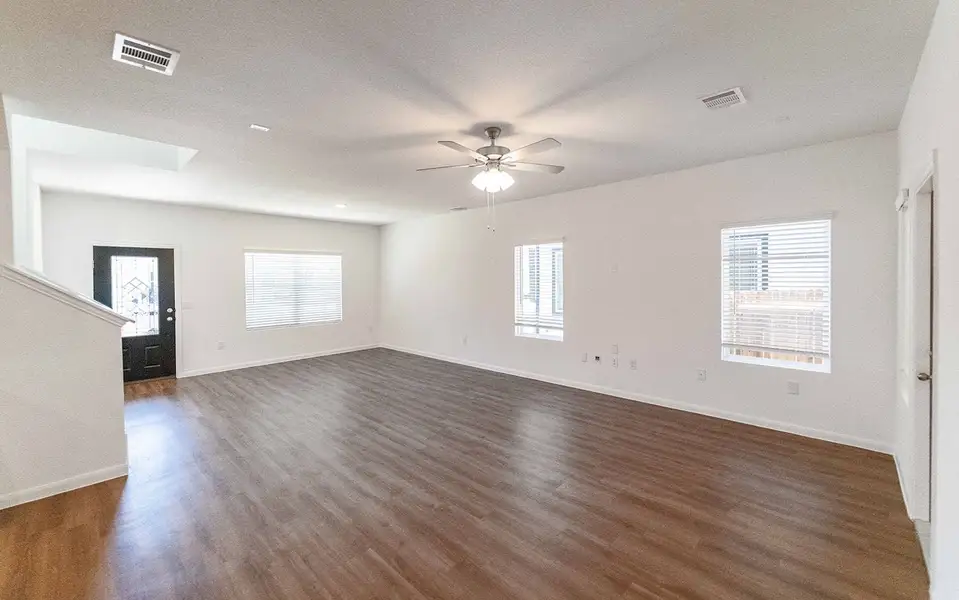 Spacious, unfurnished interior of a new home in Brooklands, Hutto (Image 7).