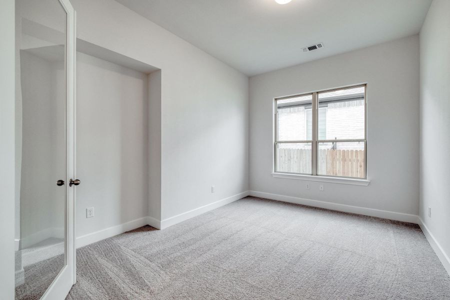 Spacious, unfurnished interior of a new home in Santa Rita Ranch - 60', Liberty Hill (Image 26). Spacious, unfurnished interior of a new home in Santa Rita Ranch - 60', Liberty Hill (Image 26).