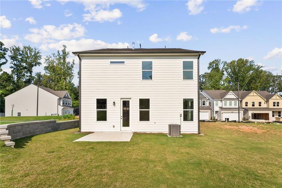 Exterior details and patio area of a home in The Village at Shallowford, Kennesaw (Image 18).