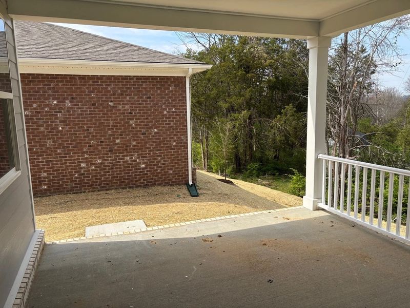 Exterior details and patio area of a home in Cedars of Cane Ridge | 55+ Community, Antioch (Image 14).