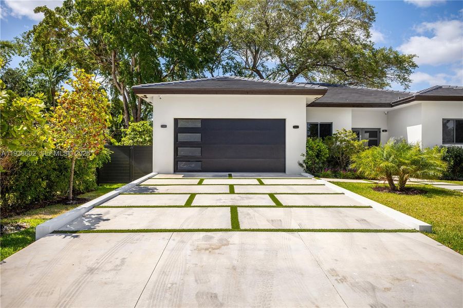 Front exterior of a new home in , Biscayne Park, FL, highlighting curb appeal (Image 25).