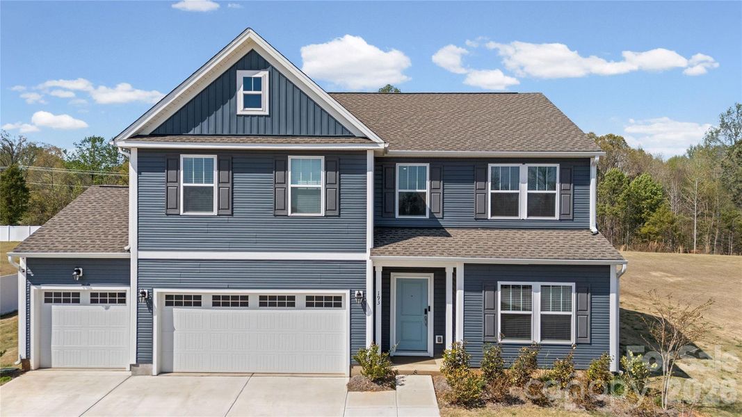 Front exterior of a new home in , Statesville, NC, highlighting curb appeal (Image 25). Front exterior of a new home in , Statesville, NC, highlighting curb appeal (Image 25).
