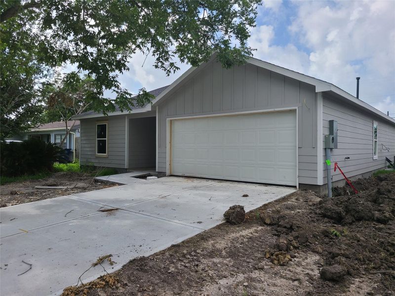 Front exterior of a new home in , Texas City, TX, highlighting curb appeal (Image 2). Front exterior of a new home in , Texas City, TX, highlighting curb appeal (Image 2).