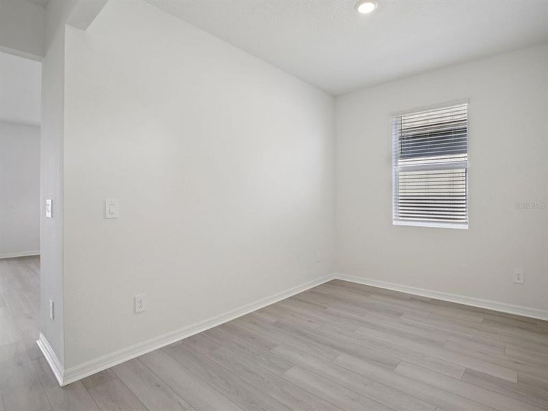 Spacious, unfurnished interior of a new home in Coasterra - Reserve Series, Palmetto (Image 13).