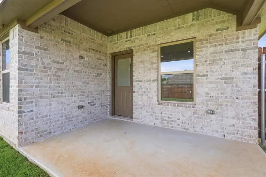 Exterior details and patio area of a home in , Springtown (Image 4).