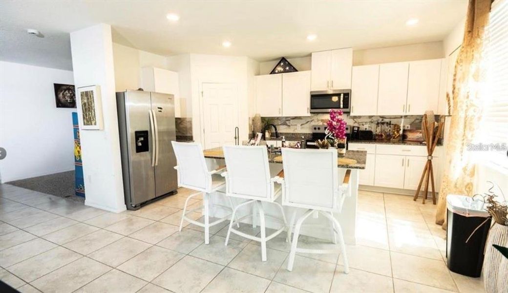 Furnished interior view inside a new home in Lake Deer Estates - Signature Series, Poinciana (Image 7).