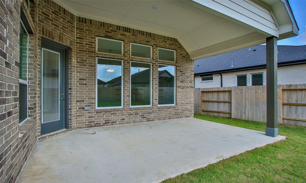 Exterior details and patio area of a home in Brookewater, Rosenberg (Image 1). Exterior details and patio area of a home in Brookewater, Rosenberg (Image 1).