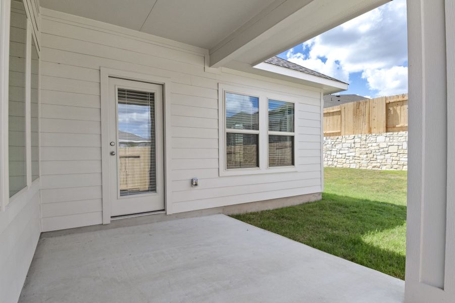 Exterior details and patio area of a home in Crosswinds, Kyle (Image 4).