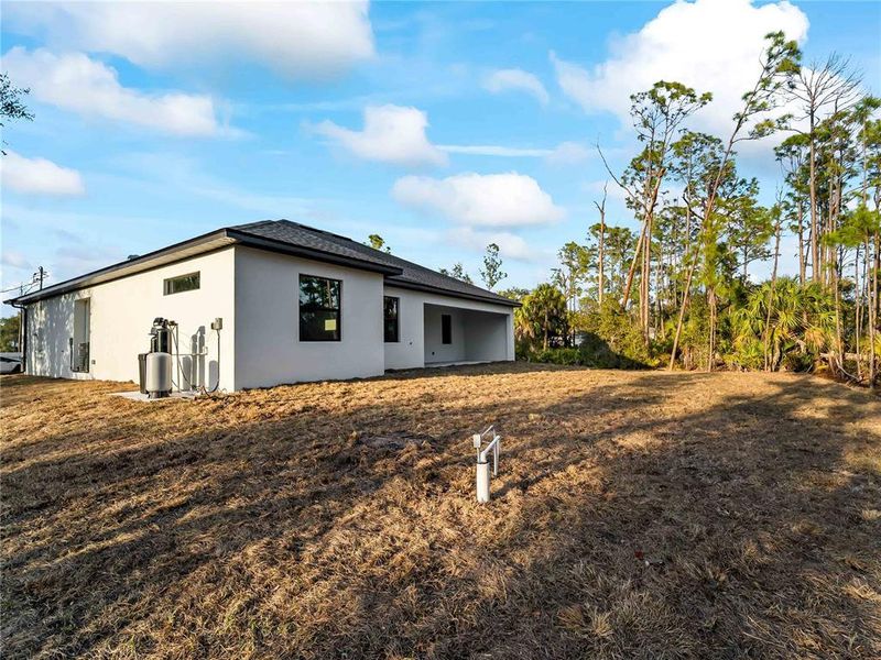 Exterior details and patio area of a home in , Port Charlotte (Image 38).