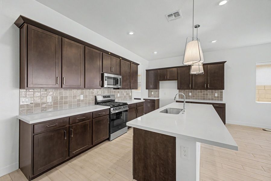 Furnished interior view inside a new home in Frontera, Surprise (Image 4).