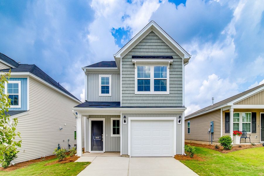 Front exterior of a new home in Bluefield, Lexington, SC, highlighting curb appeal (Image 1). Front exterior of a new home in Bluefield, Lexington, SC, highlighting curb appeal (Image 1).