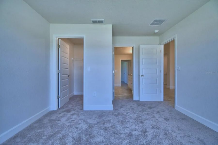 Spacious, unfurnished interior of a new home in Cadence Crossing, Auburndale (Image 26).