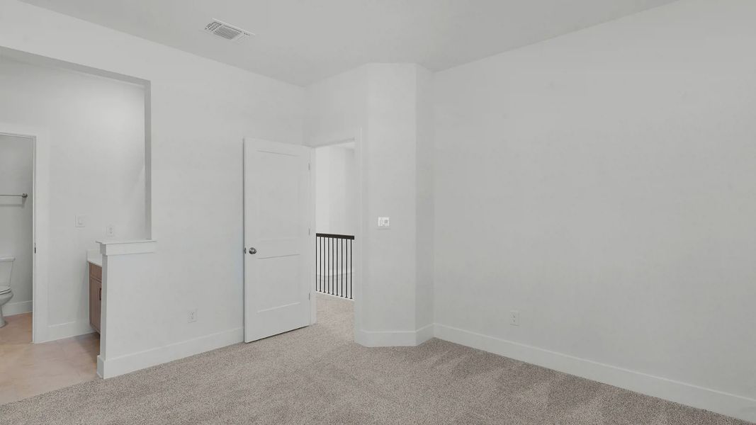 Representative unfurnished interior of a home built from the Archer by Chesmar Homes in Santa Rita Ranch, Liberty Hill (Image 21).