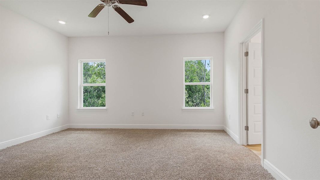 Representative unfurnished interior of a home built from the Kennedy by D.R. Horton in Bayside at Ward Creek, Panama City Beach (Image 23).