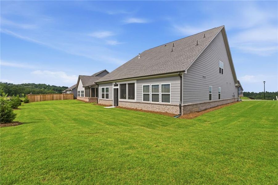 Exterior details and patio area of a home in The Court at Gainesville Township, Gainesville (Image 3).