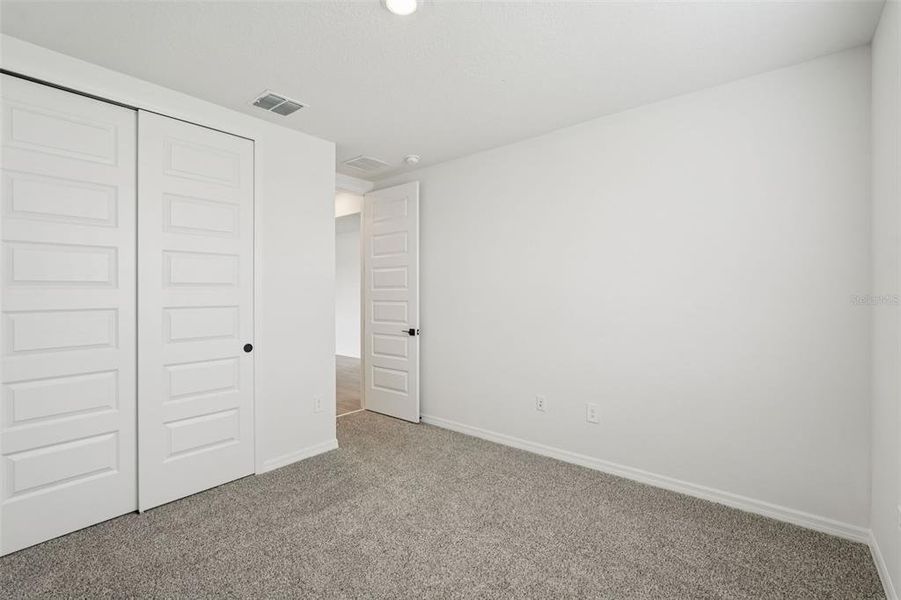 Spacious, unfurnished interior of a new home in Oakfield Trails - Signature Series, Parrish (Image 31).