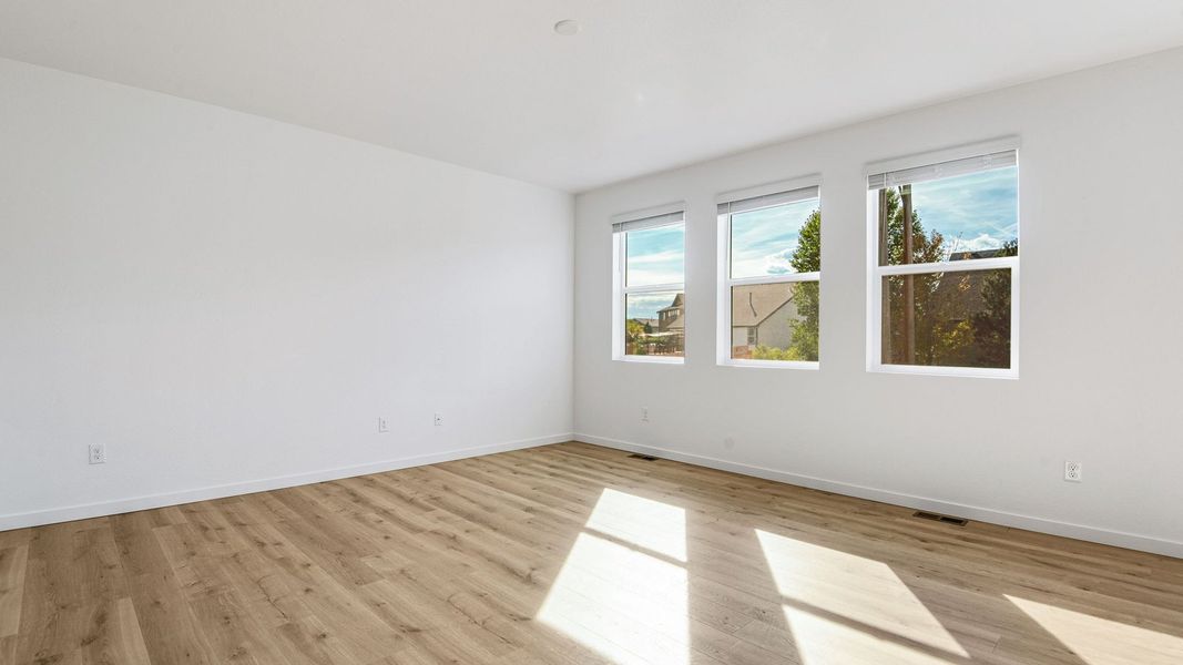 Spacious, unfurnished interior of a new home in Trails at Crowfoot, Parker (Image 17).