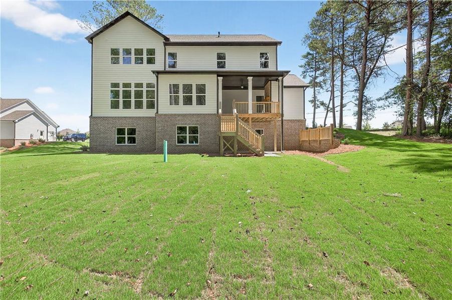 Front exterior of a new home in , Cumming, GA, highlighting curb appeal (Image 2). Front exterior of a new home in , Cumming, GA, highlighting curb appeal (Image 2).