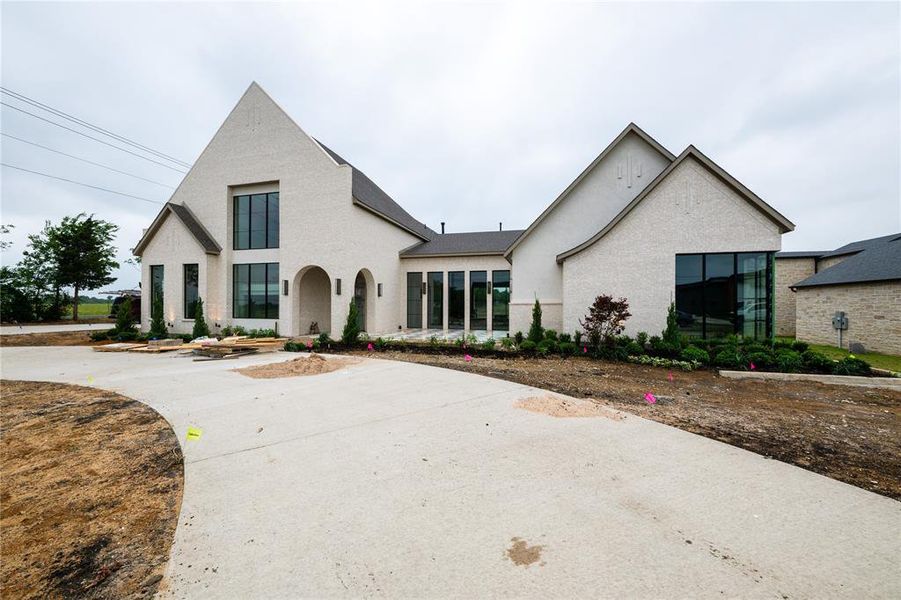 Front exterior of a new home in , Gunter, TX, highlighting curb appeal (Image 1). Front exterior of a new home in , Gunter, TX, highlighting curb appeal (Image 1).