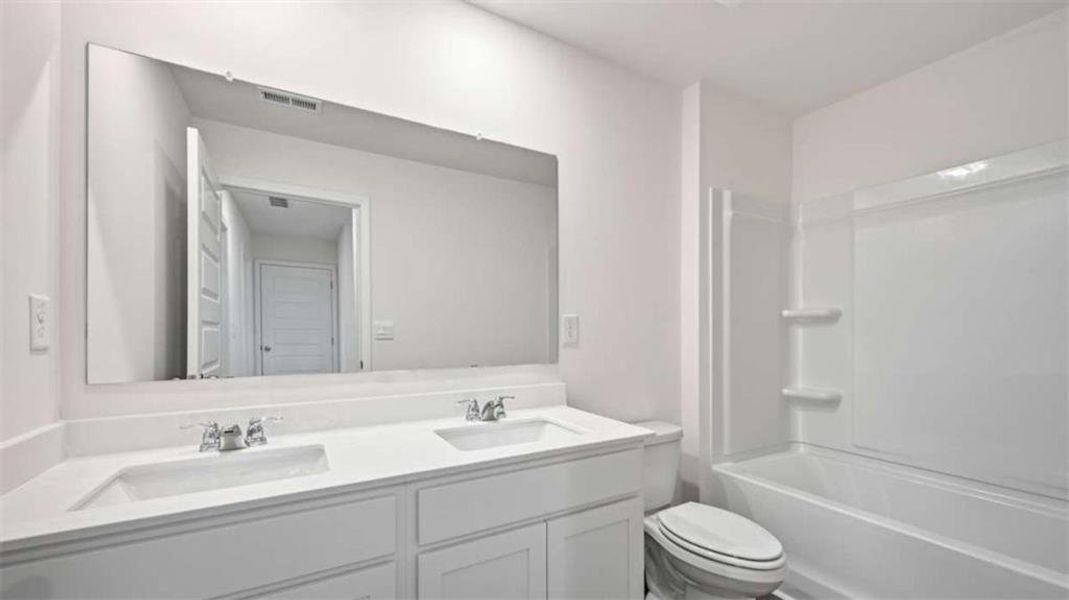 Furnished interior view inside a new home in Inverness at Sugarloaf, Lawrenceville (Image 6).