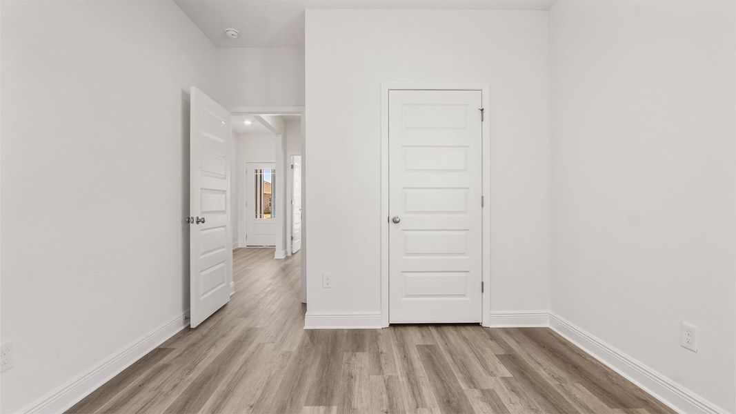 Representative unfurnished interior of a home built from the Madison by D.R. Horton in Owl's Head Farms, Freeport (Image 37).