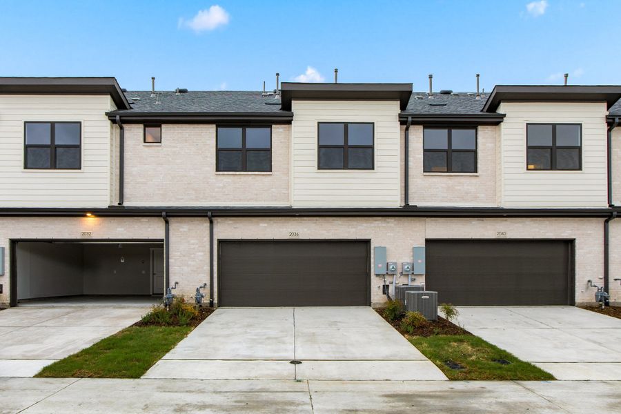 Front exterior of a new home in Ten Mile Creek, Celina, TX, highlighting curb appeal (Image 27).