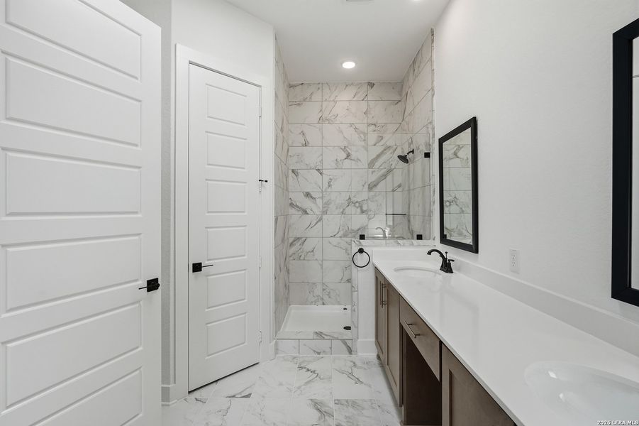 Furnished interior view inside a new home in Centero at Stone Oak, San Antonio (Image 9).