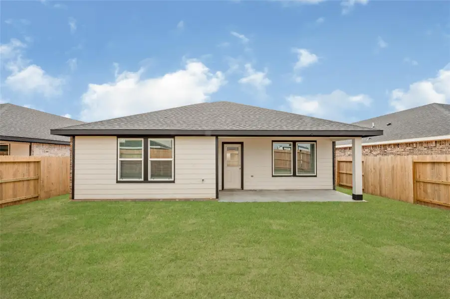 Exterior details and patio area of a home in Emberly, Beasley (Image 3).