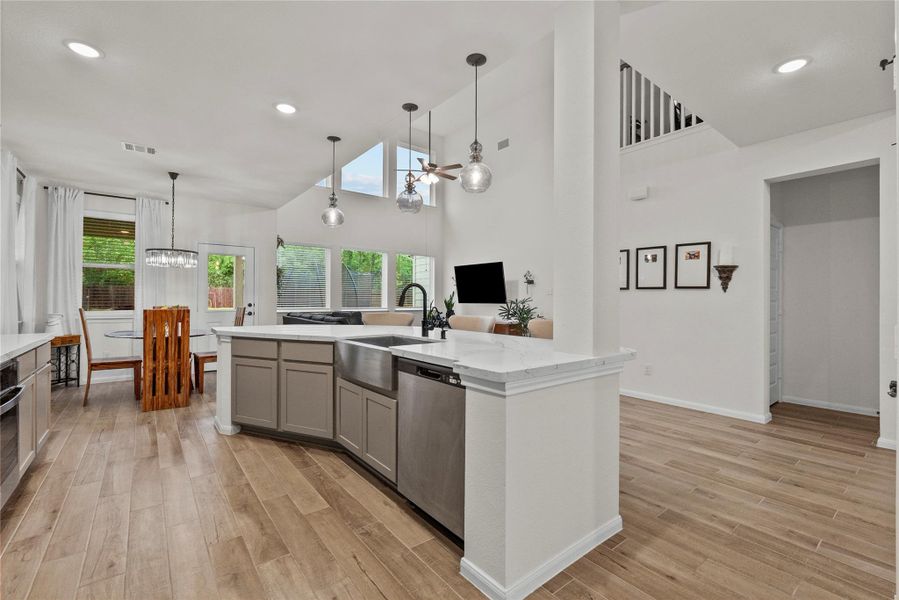 Large open island to living area with farmers sink
