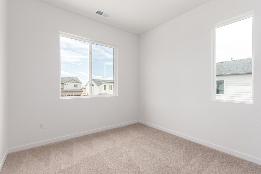 Spacious, unfurnished interior of a new home in Painted Prairie, Aurora (Image 19).