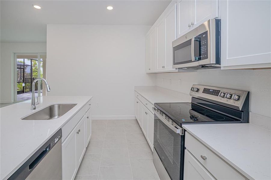 Furnished interior view inside a new home in , Punta Gorda (Image 7). Furnished interior view inside a new home in , Punta Gorda (Image 7).