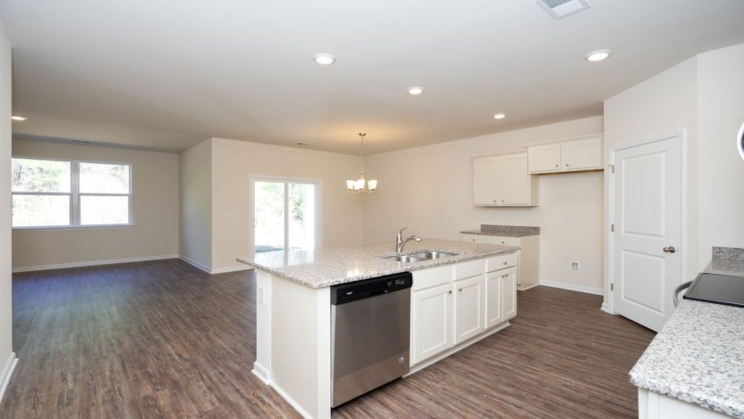 Representative unfurnished interior of a home built from the CALI by D.R. Horton in The Reserve at Wild Horse, Conway (Image 20).