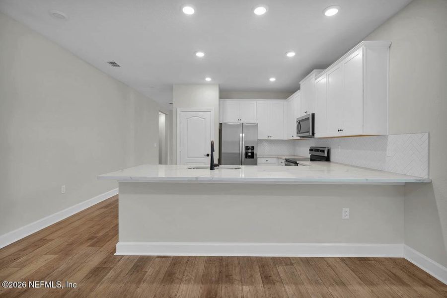 Furnished interior view inside a new home in , Jacksonville (Image 9).