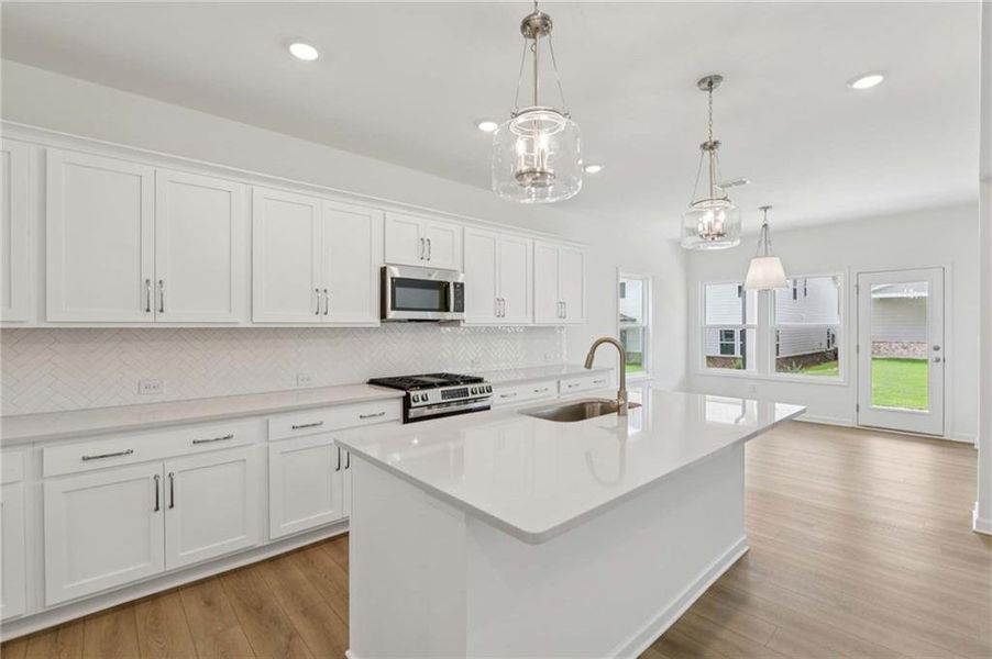 Furnished interior view inside a new home in Eastlyn Crossing - Single Family, Flowery Branch (Image 6). Furnished interior view inside a new home in Eastlyn Crossing - Single Family, Flowery Branch (Image 6).